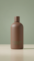 Botanical Repair Shampoo, 3/4 angle product shots on matte stone or wood surfaces with soft shadow play. Products spaced...
